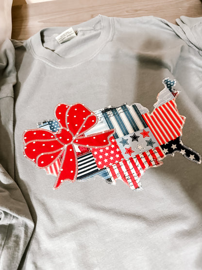 Embroidered Long Sleeve T USA Map Outline with Bow